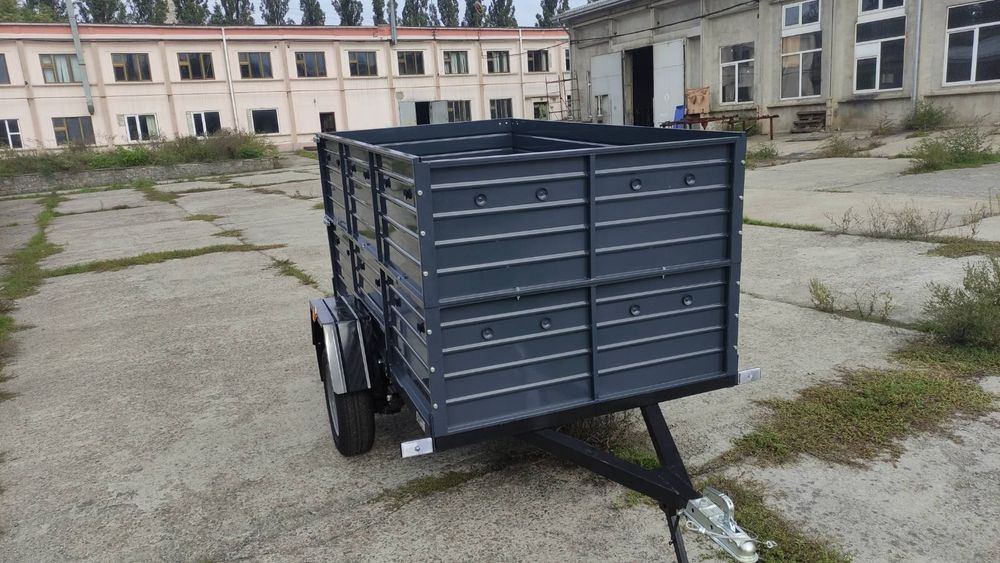 Причіп спеціалізований ПА 23 на ресорах Волга з двома бортами