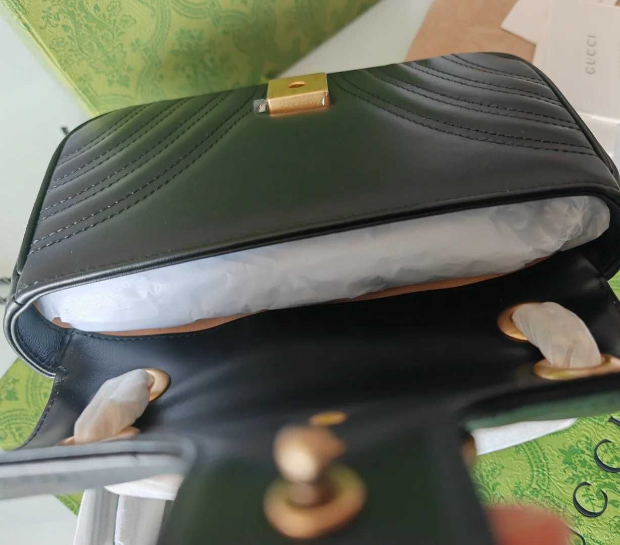 Bolsa de ombro pequena Gucci GG Marmont