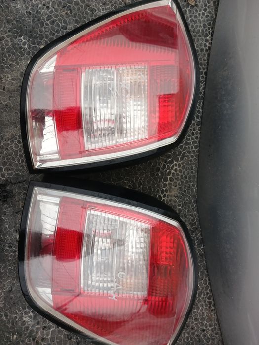 Задні ліхтарі стопи Opel adtra h унівепсал