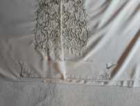 Bordado da Madeira, corte de tecido para blusa.
