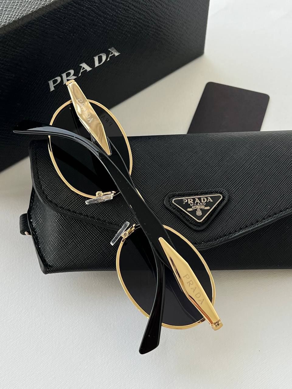Трендові окуляри овали prada
