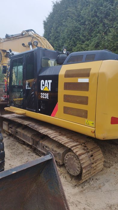 Koparka CAT 323E, gasienica CAT 950M