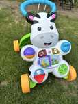 Pchacz krowa interaktywny FISHER PRICE