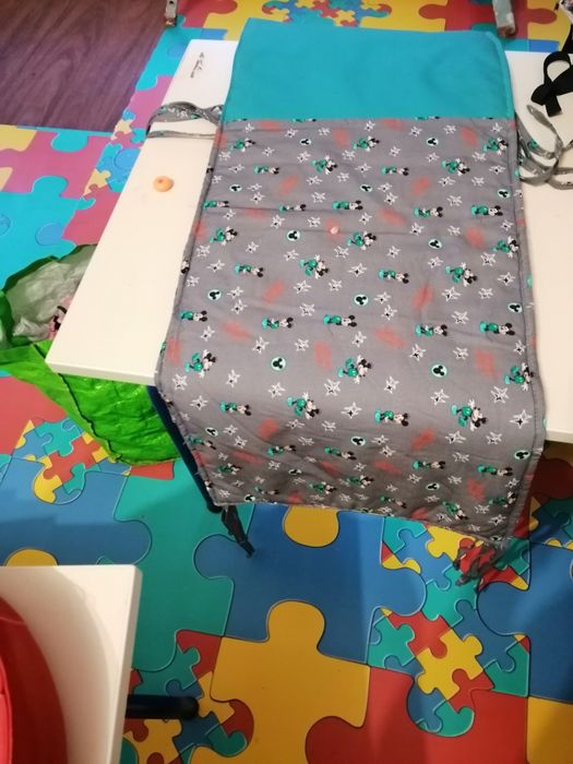 Protecção para cama de bebé