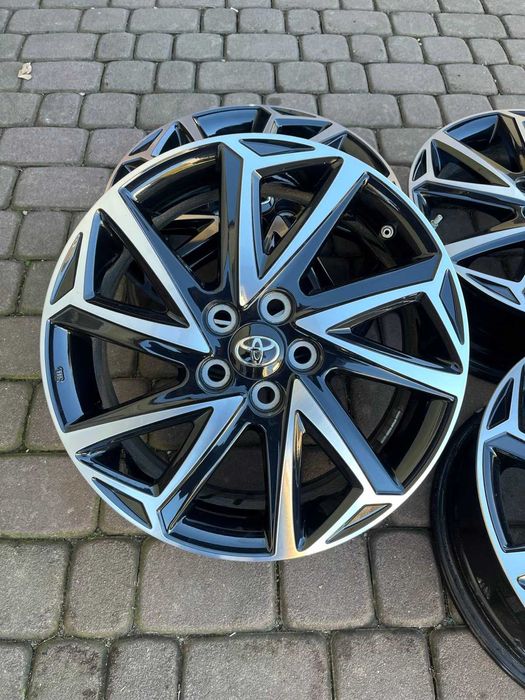 Oryginalne alufelgi Toyota 5x100 16 ca CZUJNIKI YARIS BICOLOR JAK NOWE