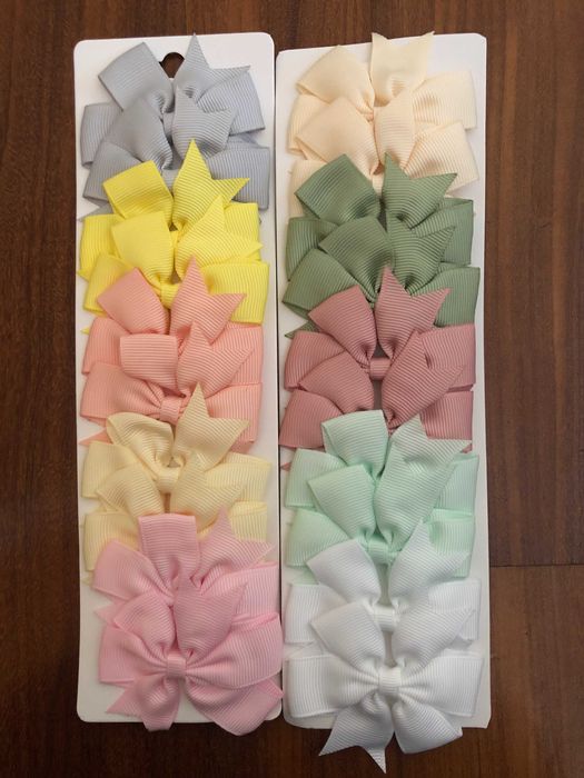 20 lacinhos criança novos