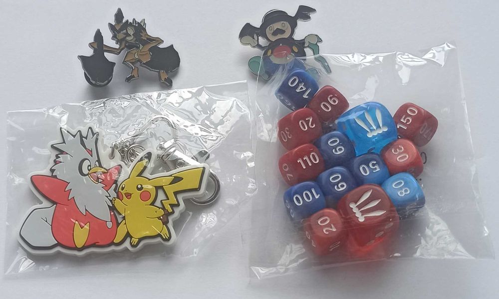 Przypinki i kości pokemon