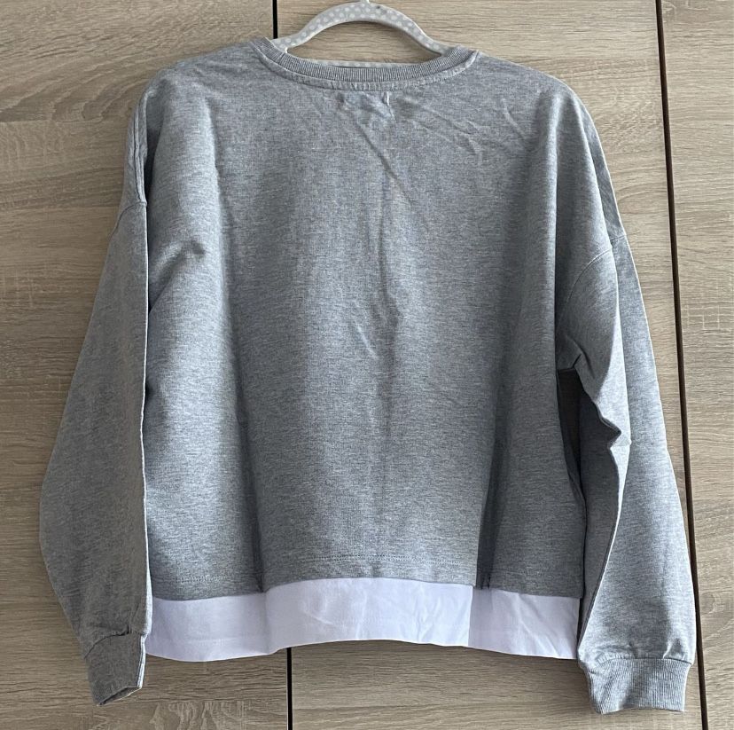 Modna bluza oversize z napisem „BALANCE”