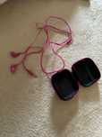 Fones e bolsa transportadora