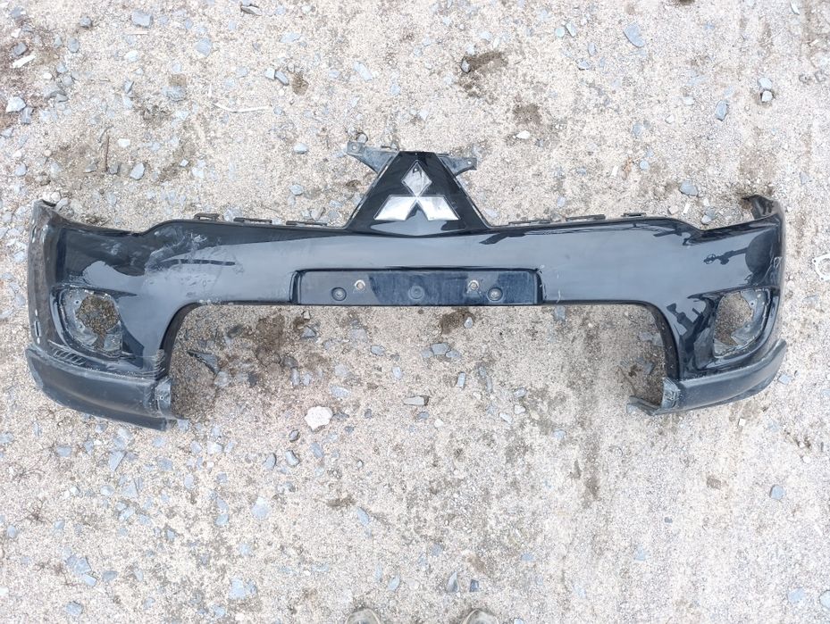 Бампер передний Mitsubishi L200 2011-2015 Рест Оригинал.