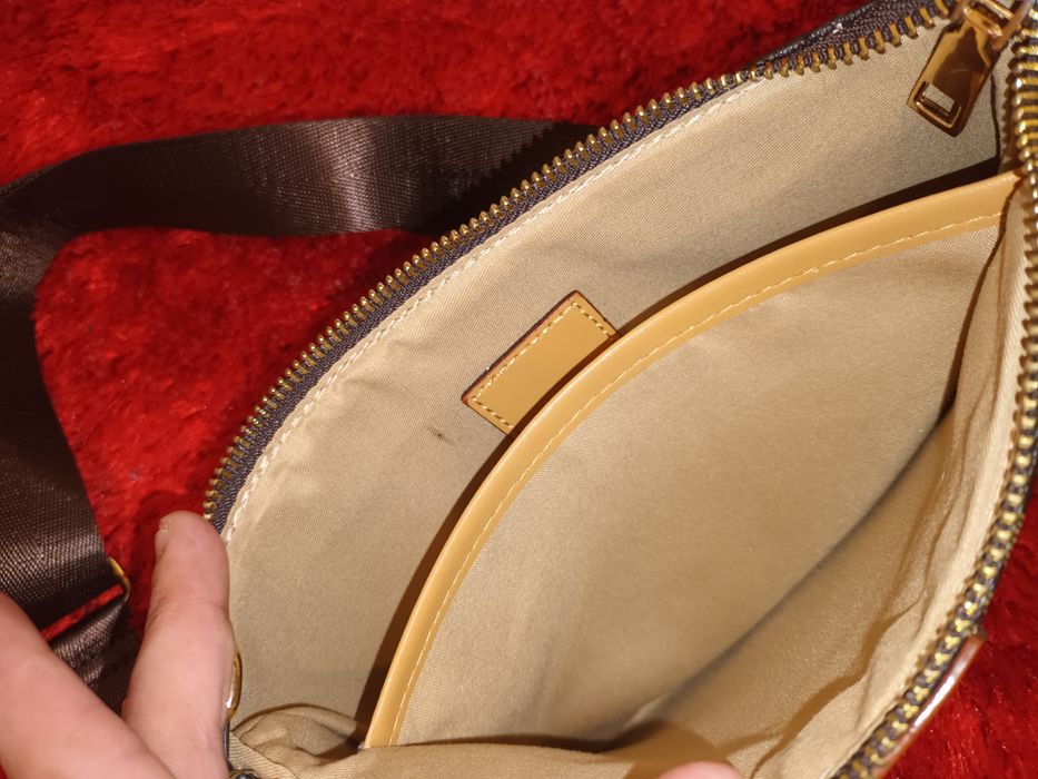 Mala tira colo para mulher