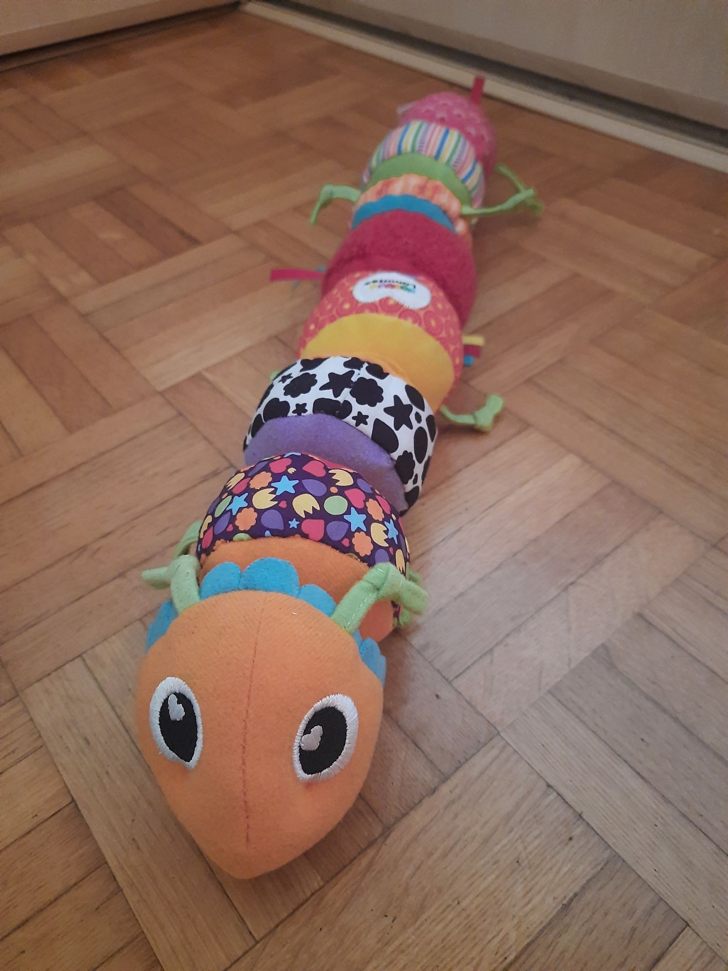 Tomy Lamaze gąsienica sensoryczna mix and mach