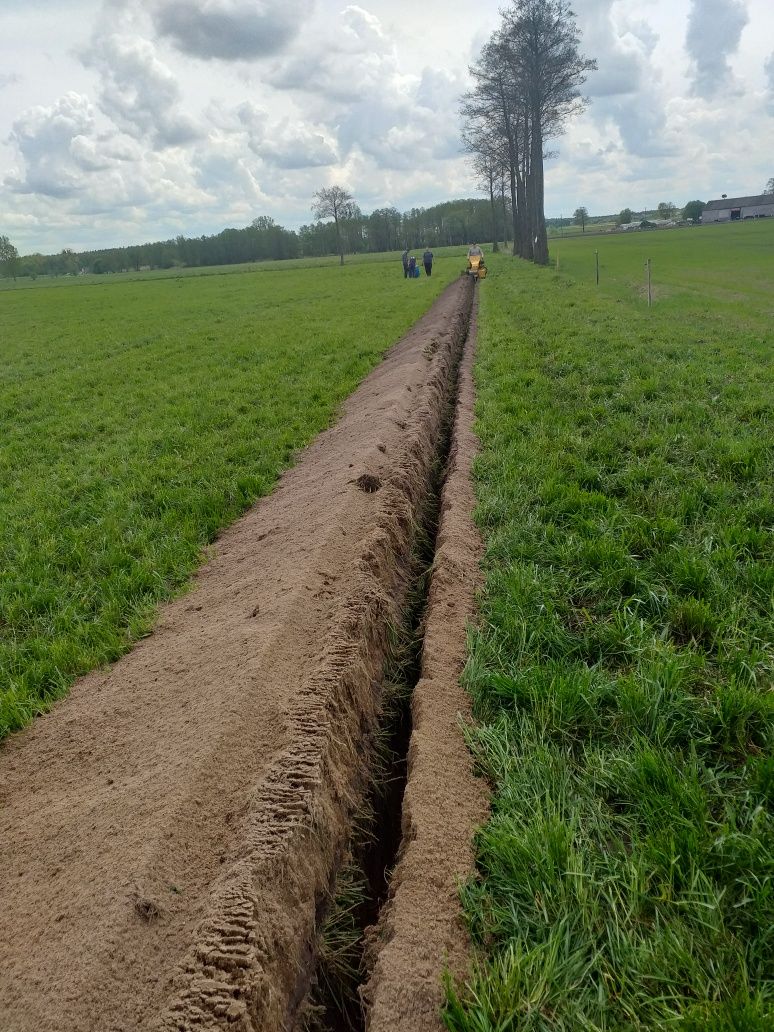 Usługi koparką łańcuchową.