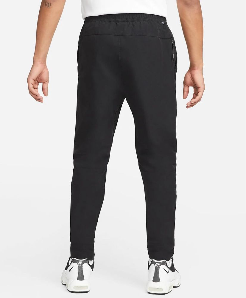 легкі штани Nike Sportswear Woven Commuter Trousers DM6621-010