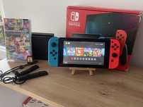 Nintendo Switch + Mario Kart, Smash Bros, Minecraft, Just Dance