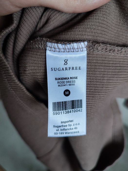 Beżowa sukienka prążkowana długi rękaw zakładka dopasowana tuba S M