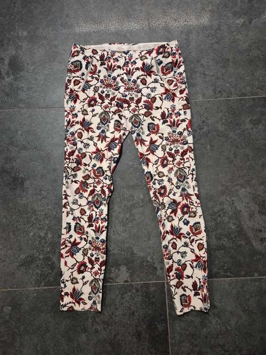 Białe wzorzyste spodnie Zara