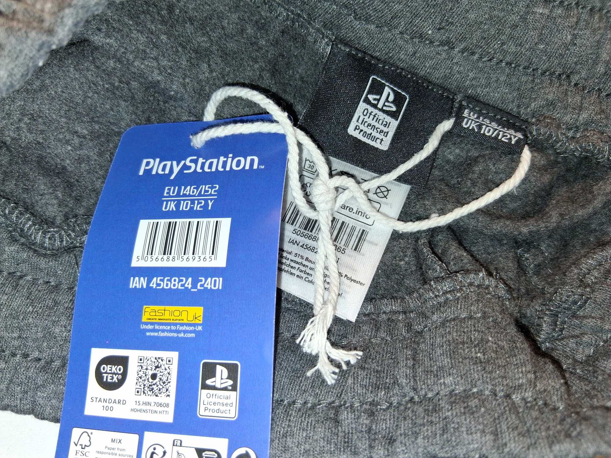A135 Spodnie Dresowe Chłopięce Sony PlayStation Szare Rozm. 146/152
