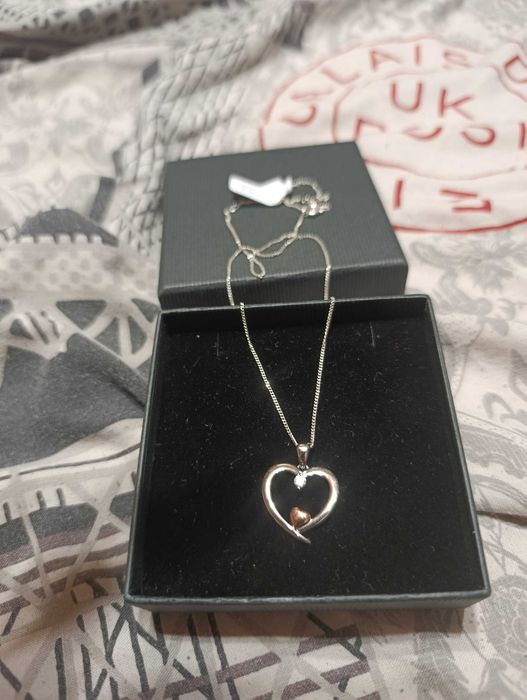 Кулон в форме сердца из желтого золота и серебра 10 карат