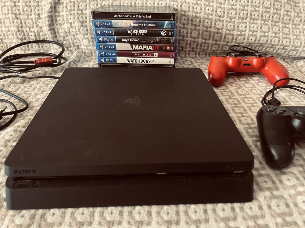 PS4 com 2 comandos e 10 jogos