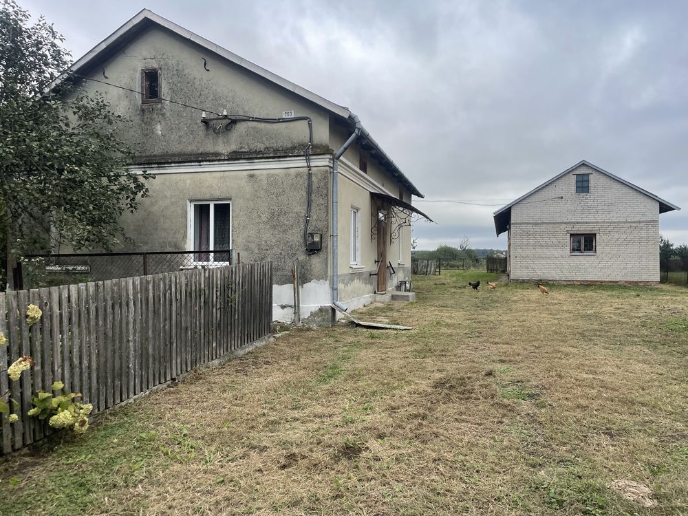 Будинок ,земельна ділянка під забудову