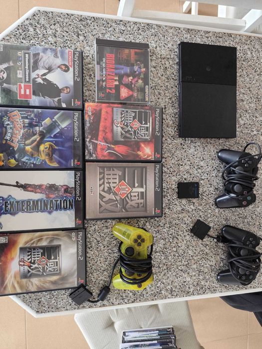 PS2 e PS3 Slim com comandos e jogos