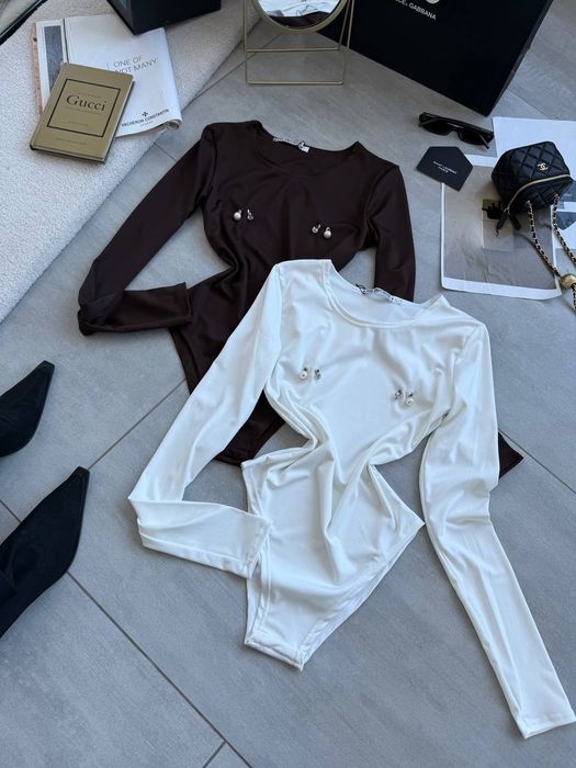 Трендове боді з пірсингом, жіночий бодік з довгим рукавом