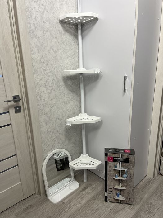 Кутова поличка та дзеркало в ванну