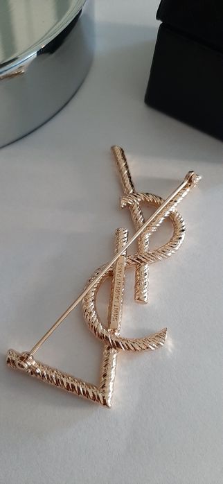 Złota broszka ysl model Opyum Cudo lv cc