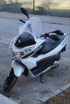 Honda pcx 125, mota acidentada na frente