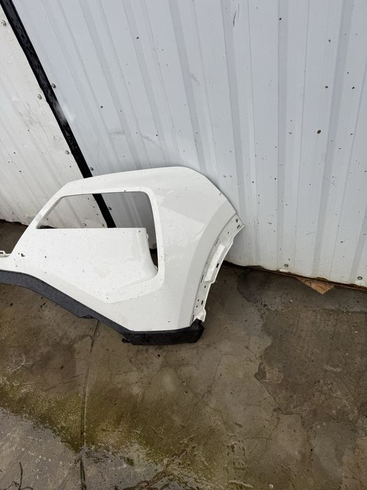 Передний бампер Nissan Rogue T33 дорест левая часть