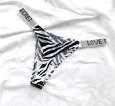 Nowe stringi zeberka Victoria's Secret S 36