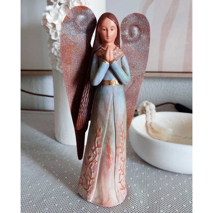 Anjo decorativo com asas de metal