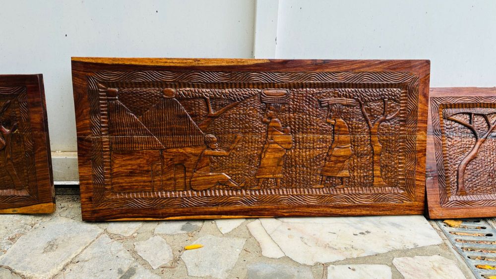 Painéis africanos em talha