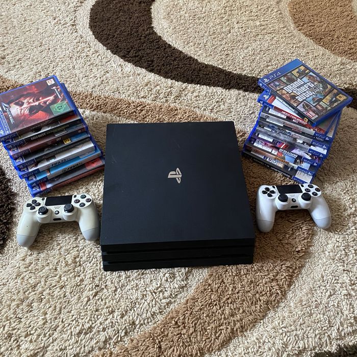 PlayStation 4 Pro + 2 джойстика + 15 ігор