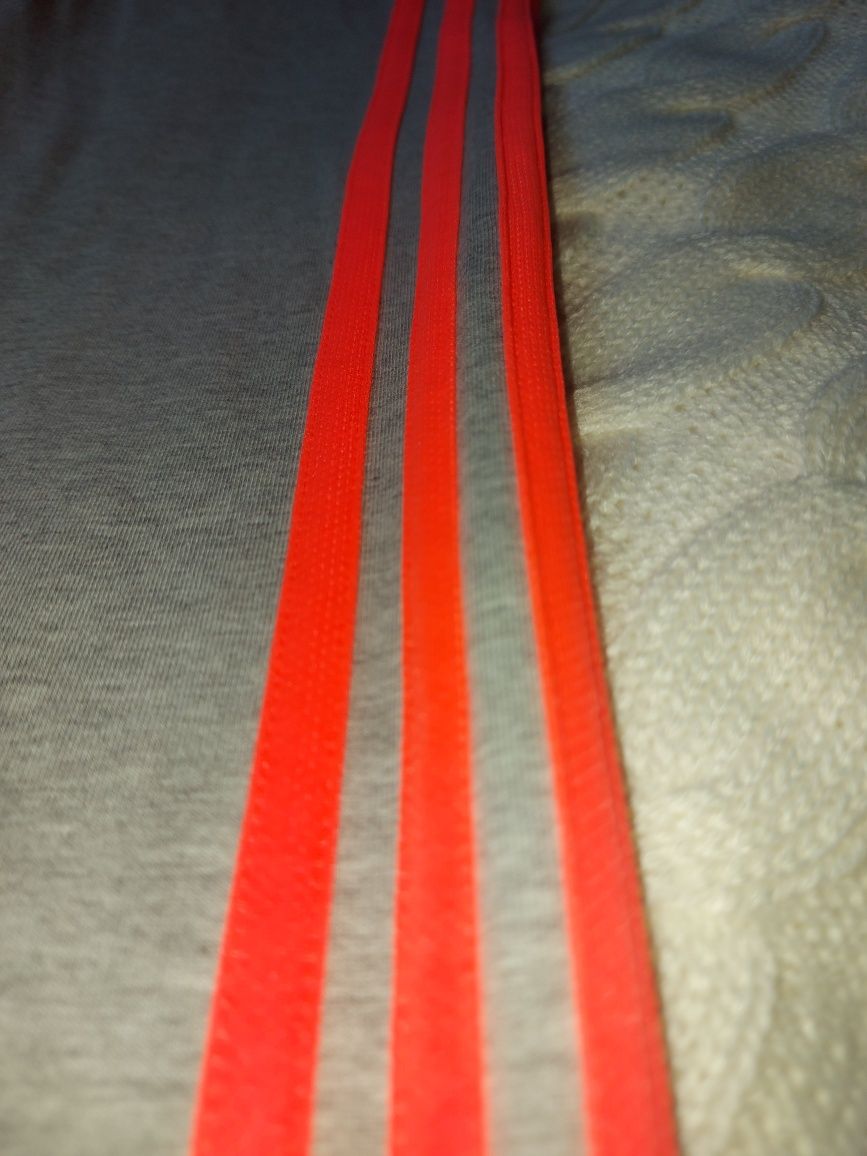 Adidas Siwe szare z pomarańczowymi paskami oryginalne leginsy s m 164