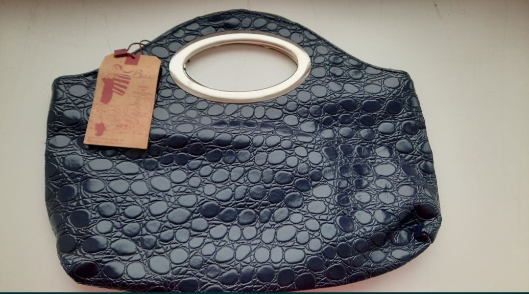 Нова шкіряна сумочка - клатч ,куплена в Турції .
Відправка новою чи ук