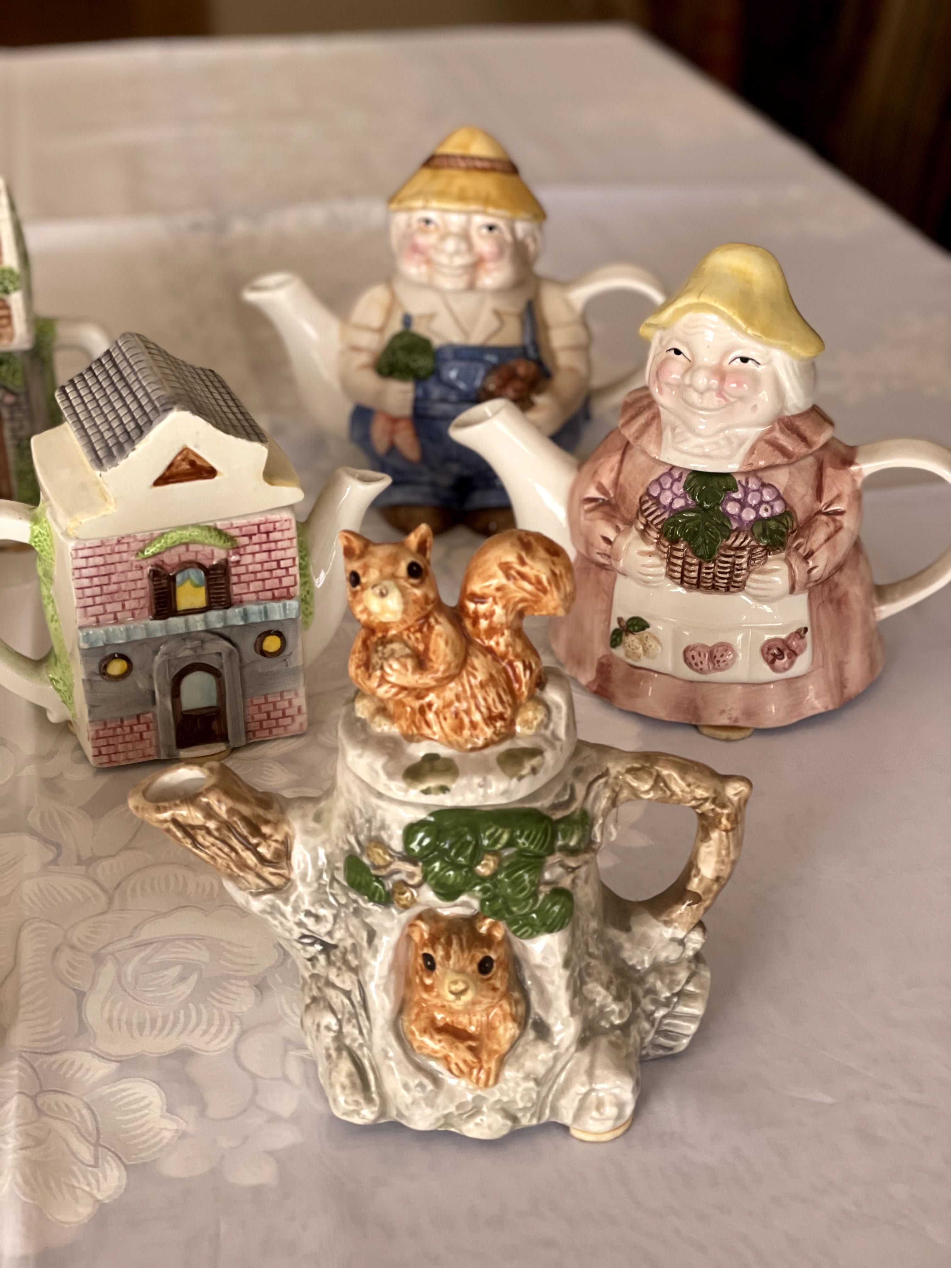 Conjunto de 8 bules de chá decorativos