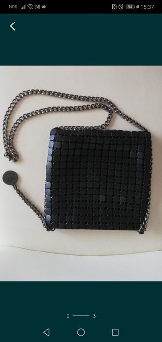 Clutch metálica com corrente