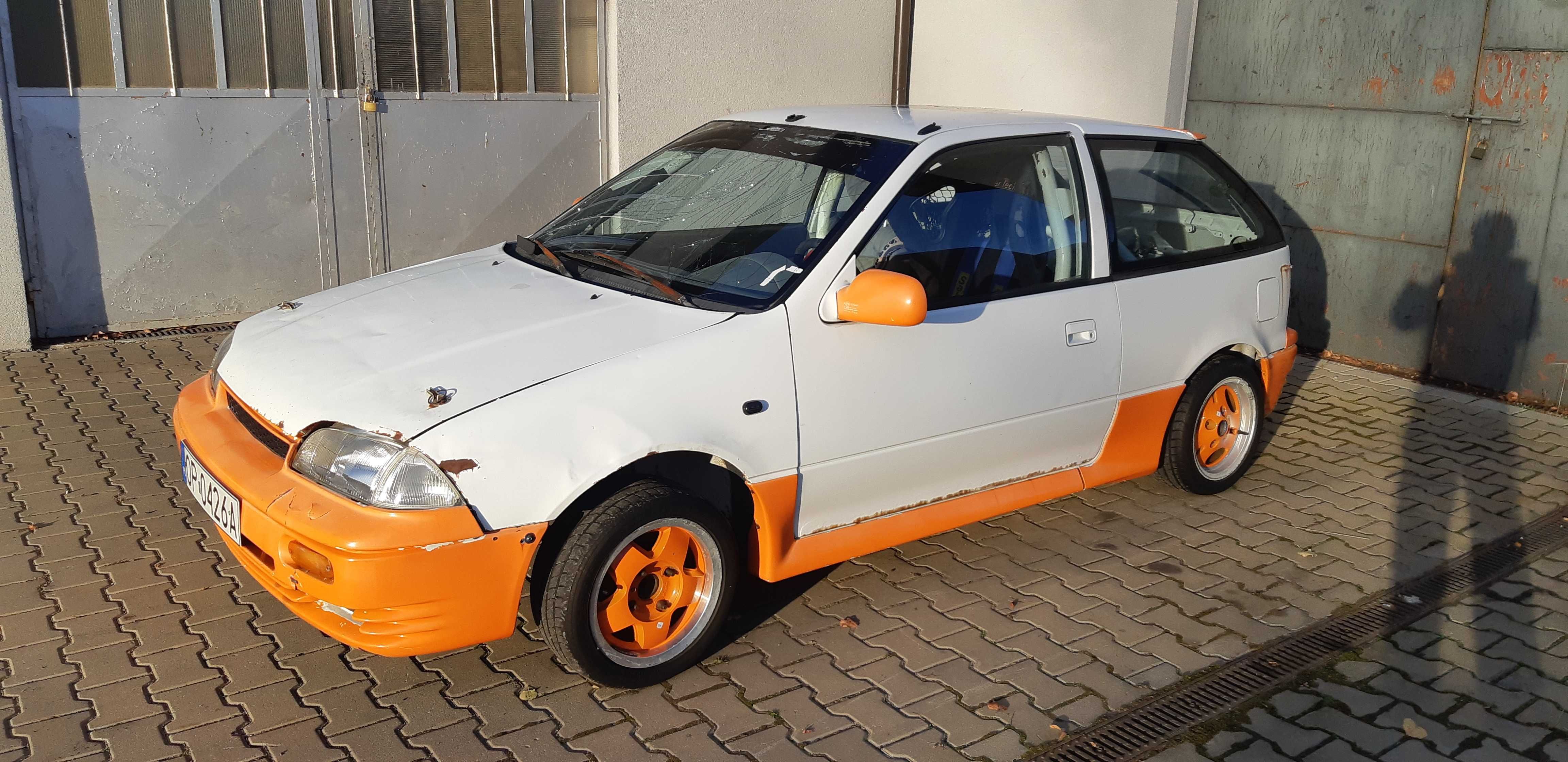 Suzuki Swift II GTI Maska zderzak fotele klapa