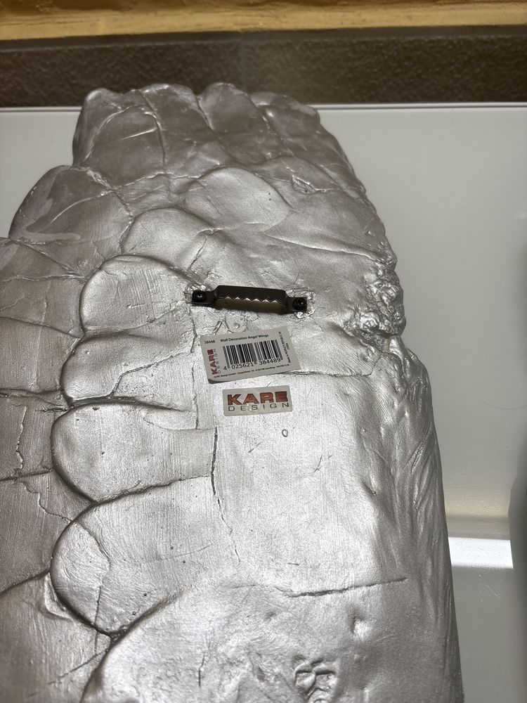 Assas de anjo prateadas da marca kare