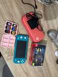 Nintendo + carregador com capa protetora e jogos