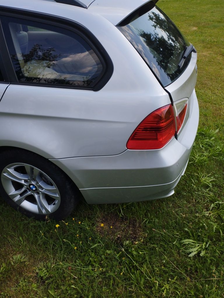 Bmw e91 błotnik lewy tyl