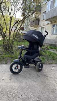 Трех колесный детский велосипед черного цвета