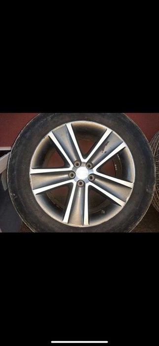 Диски легкосплавні з гумою