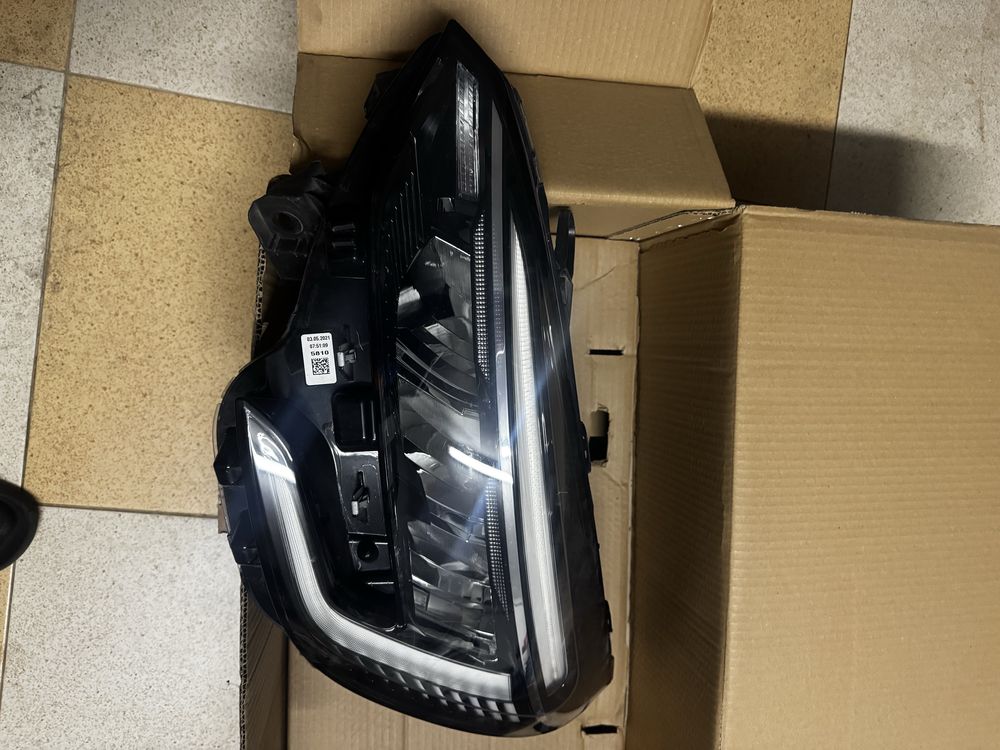 Farol renault clio