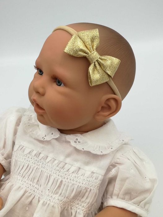 Opaska na głowę bezuciskowa kokarda złota