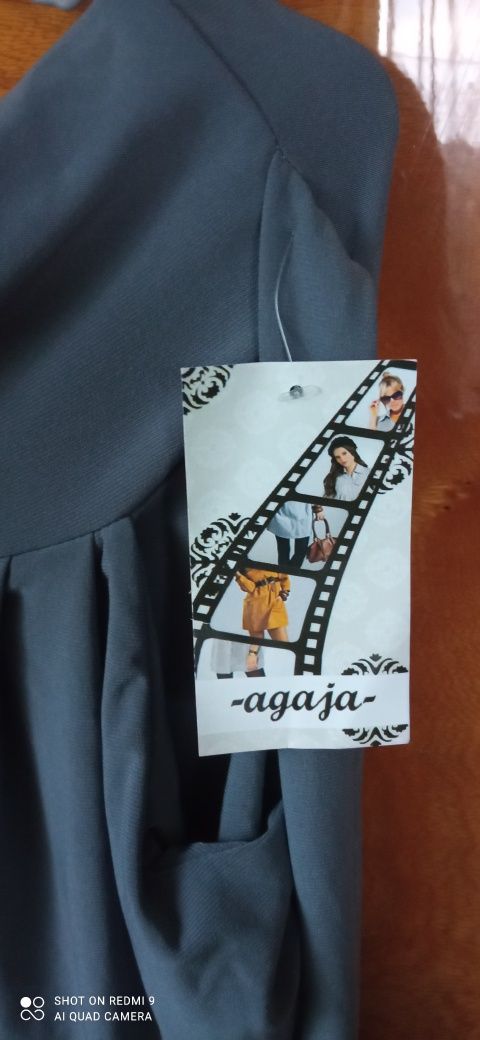 Nowe szare eleganckie materiałowe spodnie rozm. L/ XL