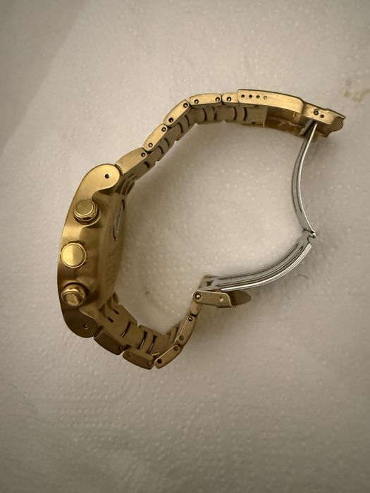 Religio swatch irony dourado