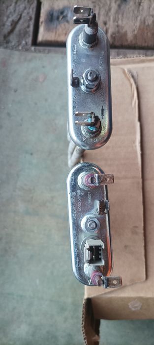 Electrolux Zanussi Aeg тен, замок люка, пресостат реле рівня води, тер